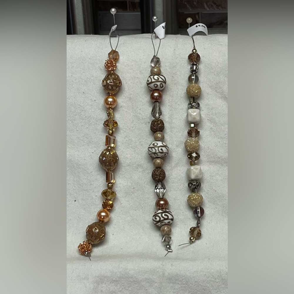 Jessie James Beads.  Soft champagne colors set of 3 strands